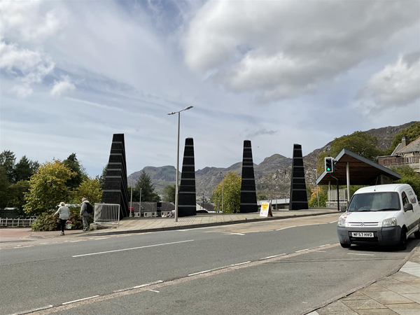 Crossing over High Street at the traffic lights, you pass the 40 feet high Slate structures that have been designed to showcase how the slate industry grew and helped the town to prosper,  each of the structures hav poetry engraved on the slate.