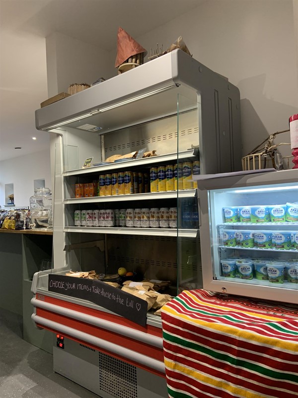 Image of cold cabinets full of drinks and ice-cream