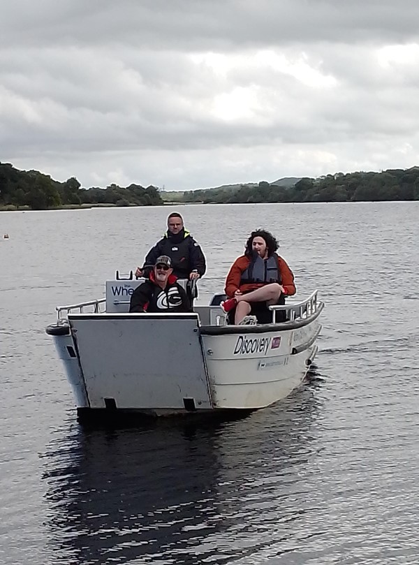 Coming back to shore. Front of the boat winds down onto slip so you do not need to come out of your wheelchair.