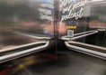 image of the handrails and mirrors inside the lift