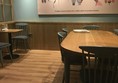 Seats around table there is also availability of plugs in this area for laptops  and mobile phones