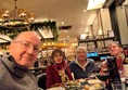 Image of people sitting at a table