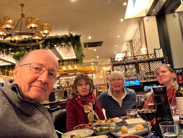 Image of people sitting at a table
