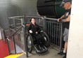 Picture of a wheelchair user using a chairlift