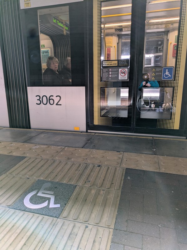 Image showing the level access to the tram. Tactile paving close to closed tram doors