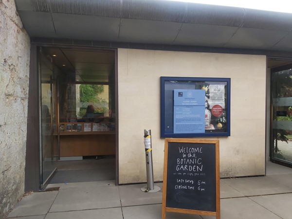 Ticket desk and chalk board saying "Welcome to the Botanic Garden"