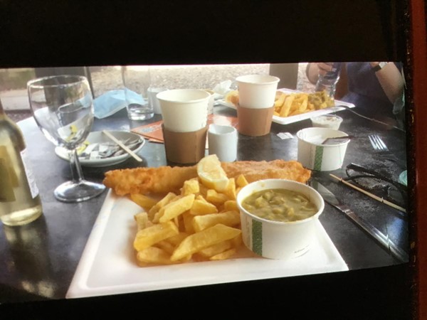 Fish, chips, mushy peas with a bottle of white. Wine and glass. DELICIOUS!!!!