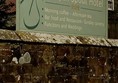 Picture of a wooden sign for The Mallyan Spout Hotel