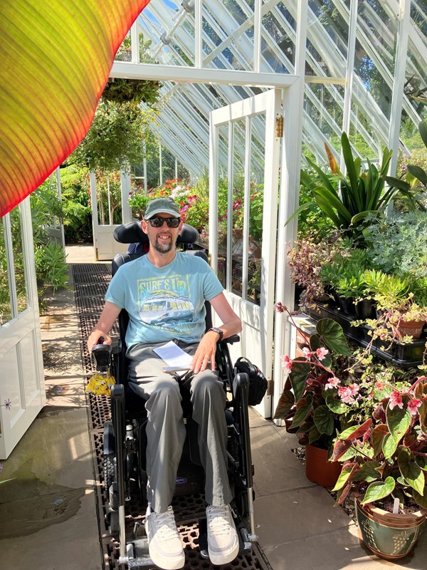 Powerchair user in a hot house