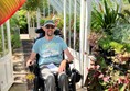 Powerchair user in a hot house