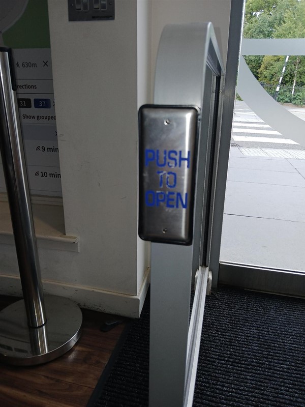 image of the door open button on the inside of the right door