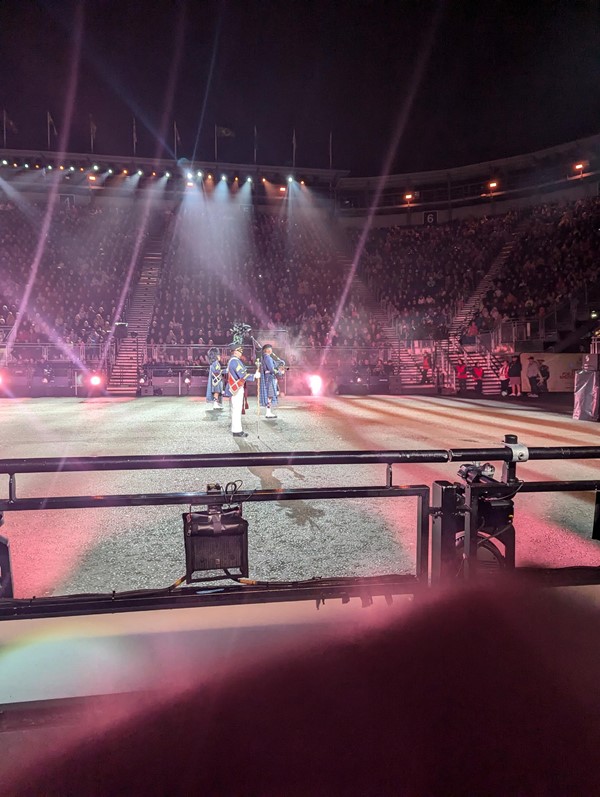 Image of pipers on stage