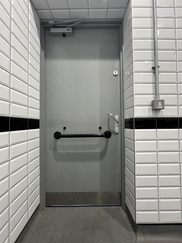 Image of accessible toilet door from the inside