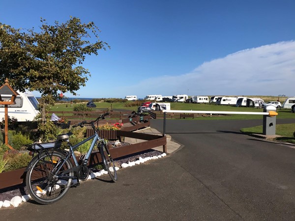 Photo of the entrance to the caravan site.