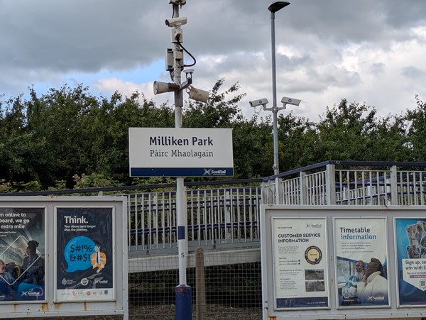 Image of station sign near ramp