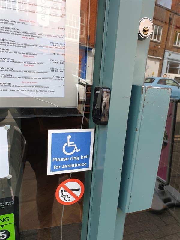 Image of a buzzer notice on a door