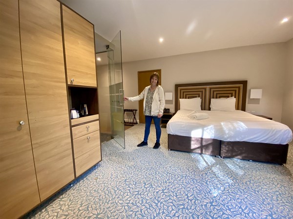 Spacious room with comfortable bed