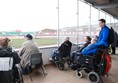 Watching the riders from viewing platform at Glasgow Speedway