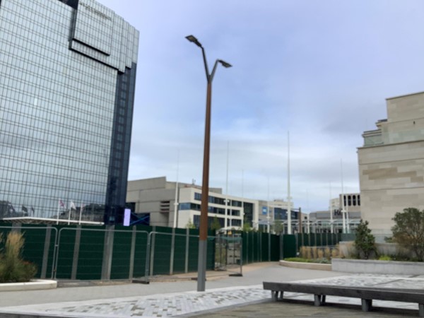 Our photo shows the ramp available above brown brick work, that will get you down to lower level for hotel entrance, OR BETTER STILL, when you get off the tram, opposite the station, and in between the Hyatt hotel and next building