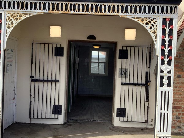Picture of an ornate WC doorway