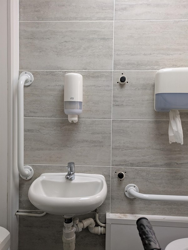 Image of sink with broken rail