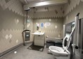 Image of large accessible toilet with a ceiling hoist