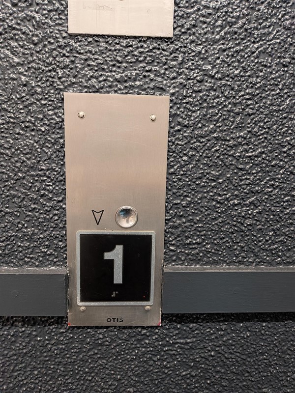 image of lift call button