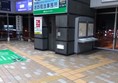 Photo showing the east entrance lift and tactile paving strips leading to the lift.