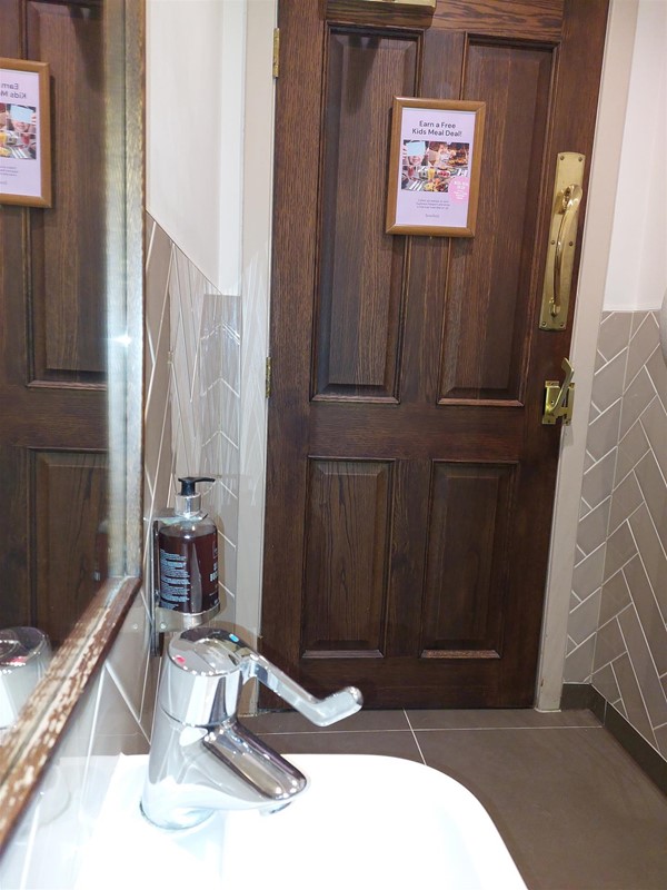 Image of a sink and door