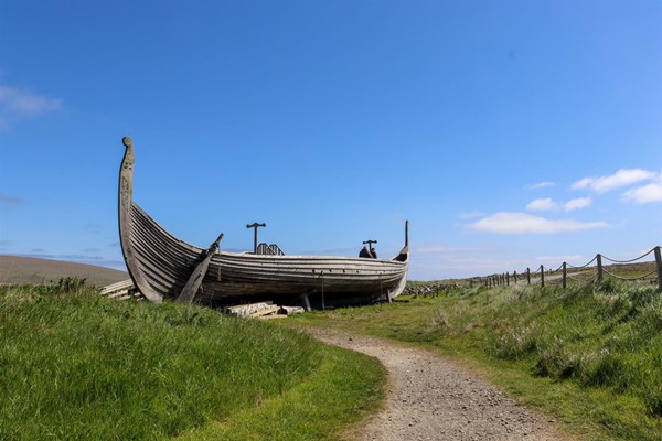 Viking ship with path to it.