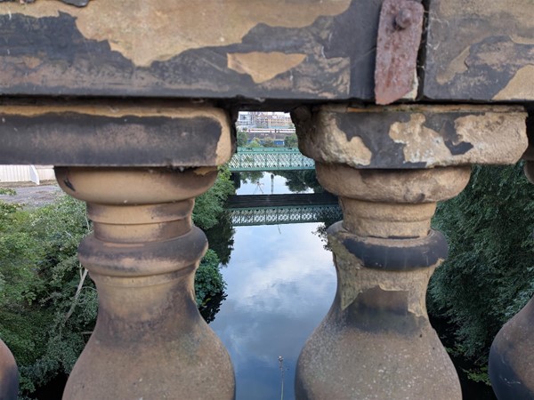 image of railing and water