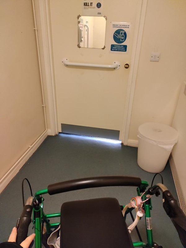 Inside the accessible toilet view of the door