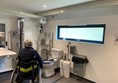 Image of a wheelchair user in an accessible toilet