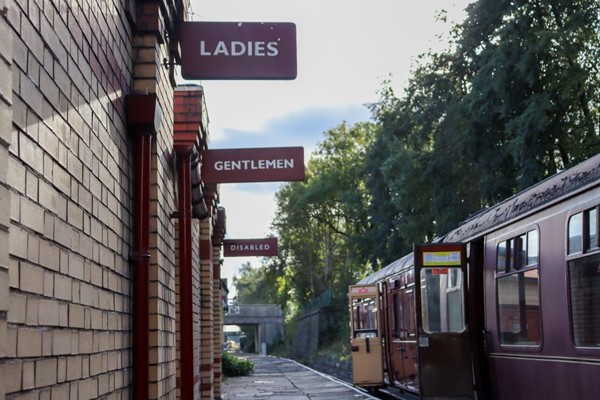 Toilet signs on the platform