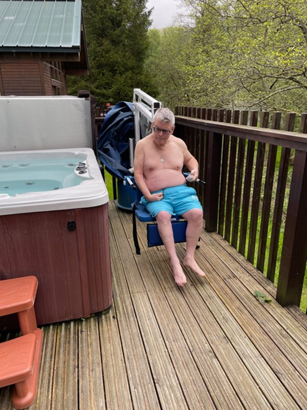 By the hot tub.  Photo to show the hoist, not yours truly