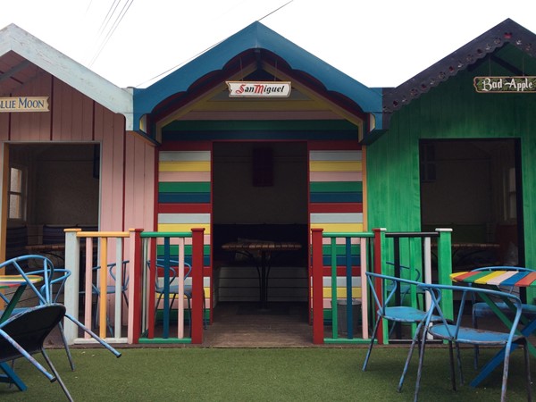 Photo of the beer beach huts.