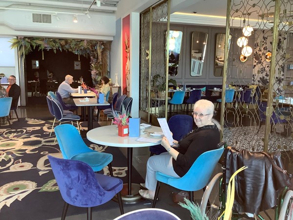 People in the seating area of the cafe