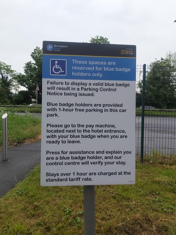 Image of a blue badge sign