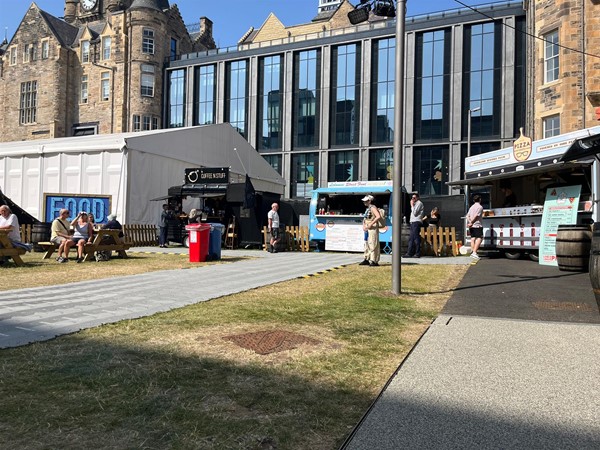 Image of the food trucks in the courtyard.