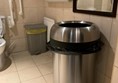 Large bin in accessible toilet