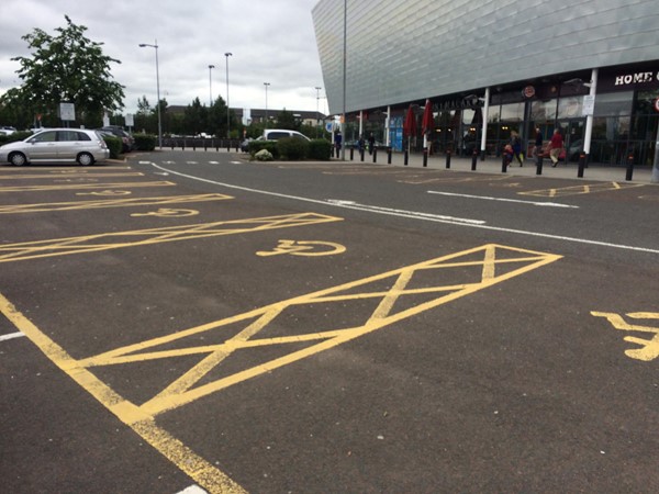 Photo of accessible parking bays outside centre.
