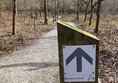 Image of a trail marker on a post.