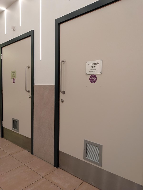 image of the doors to the first floor accessible bathrooms