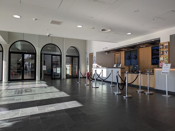 Image of reception desk at the nearby rep theatre - which shares a building