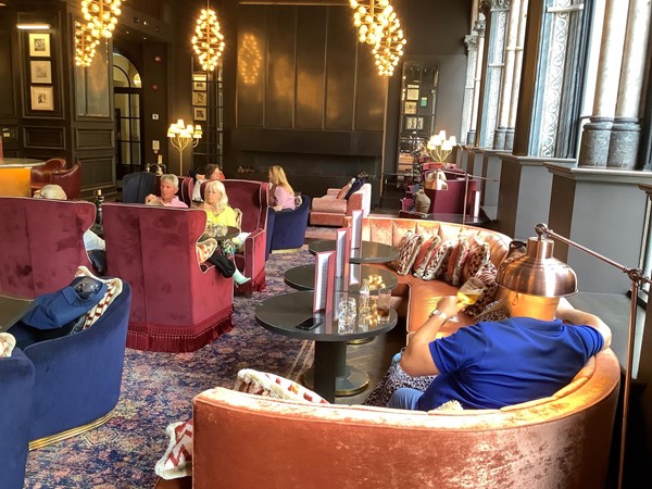 An opulent lounge with velvet seating