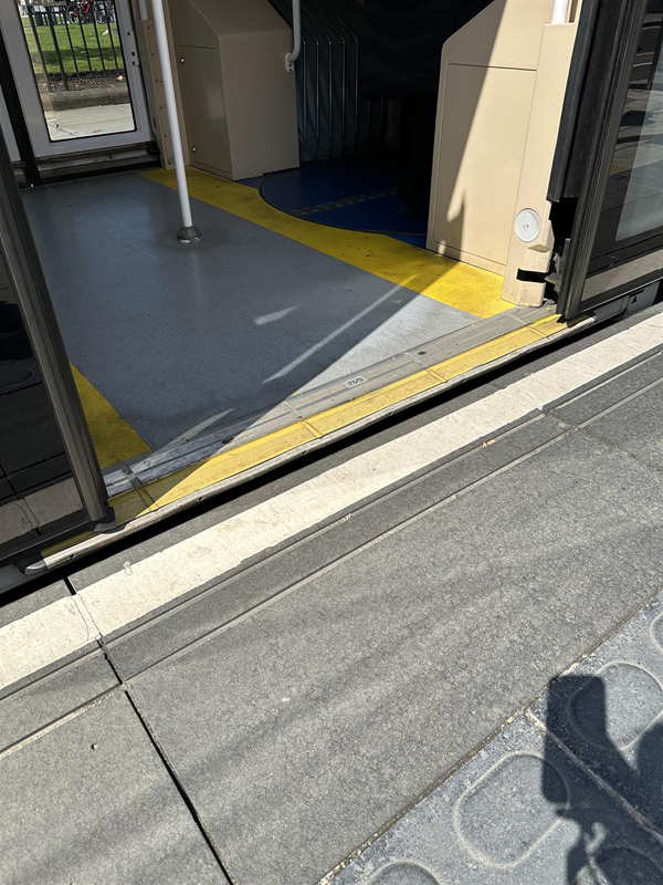 Image of tram stopped at stop