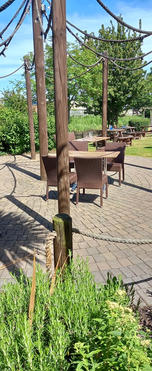 Further outdoor seating. Wheelchair accessible tables