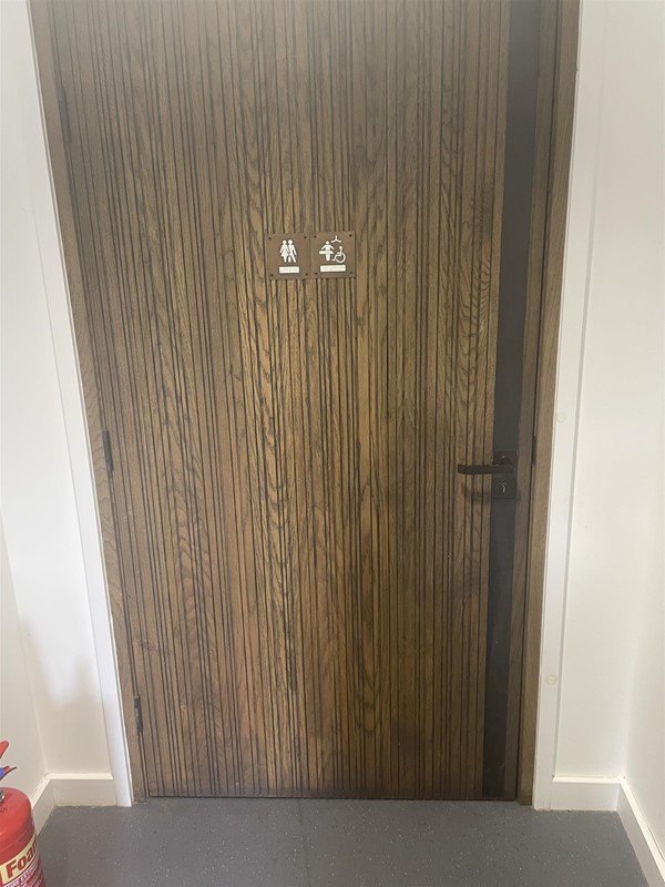 Image of a toilet door