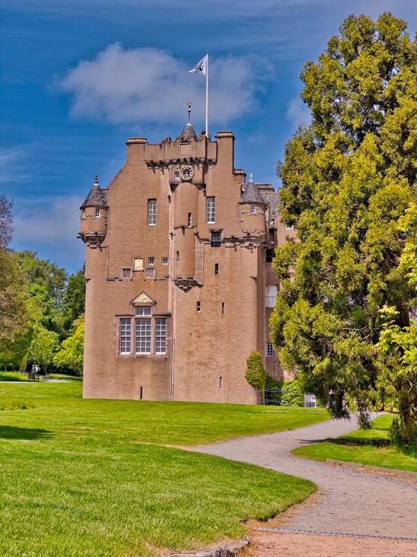 Crathes Castle from the entrance to the lower garden.