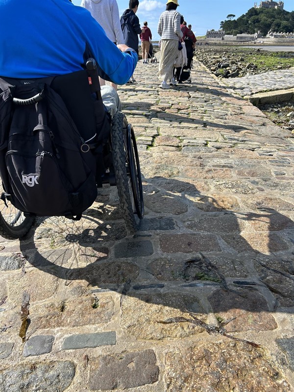 Image of a wheelchair on a causeway